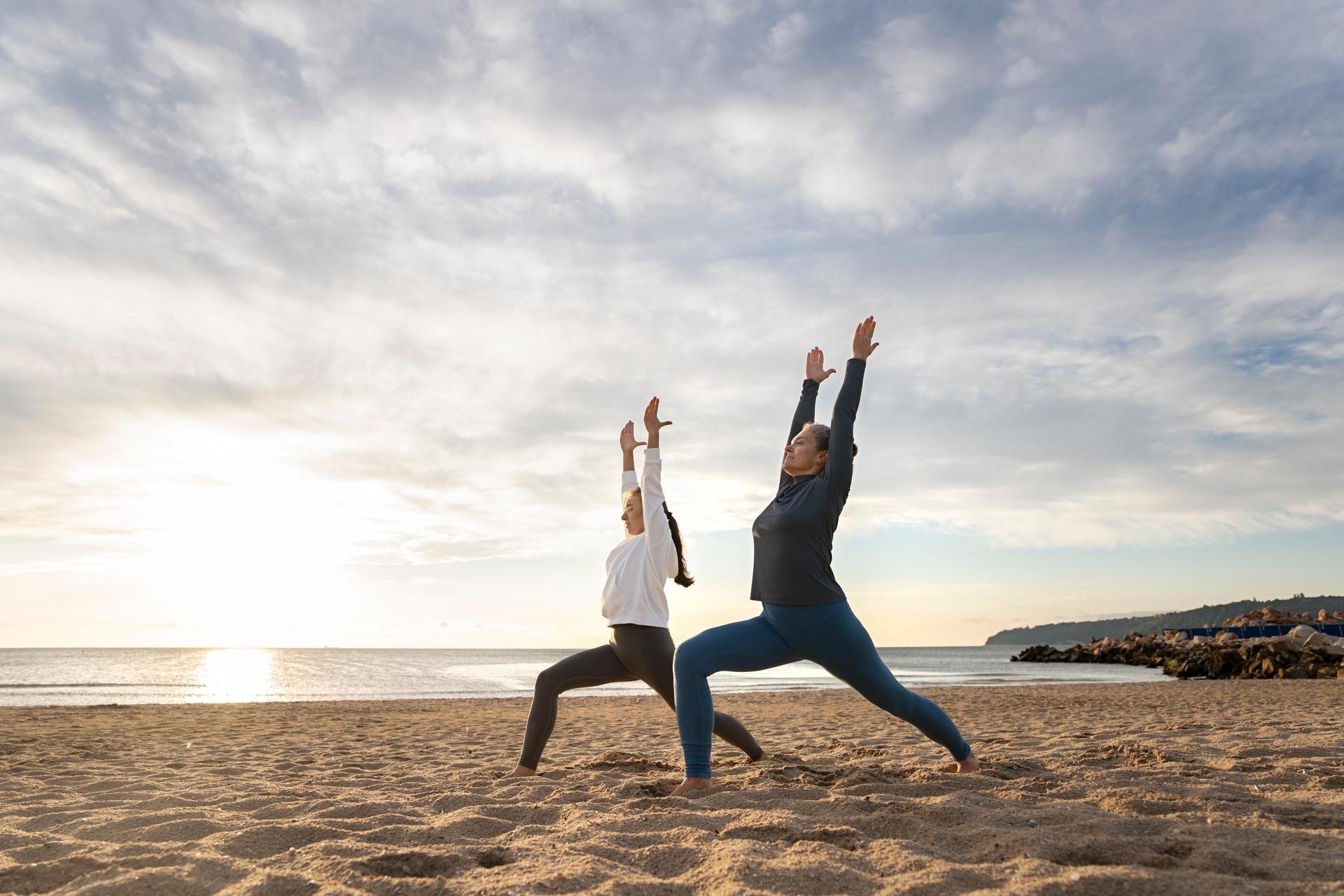 Mother Daughter Doing Yoga Side View